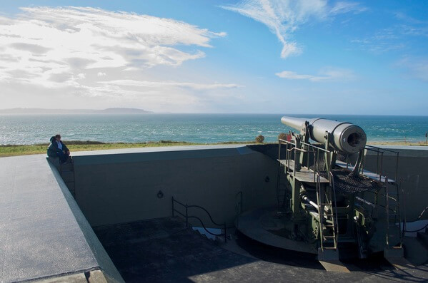 The two 10-inch guns on disappearing carriages currently mounted at Fort Casey were transferred from the Philippines in the 1960s, along with two three-inch guns. The 10-inch guns are M1895MI (No. 26 and No. 28 Watervliet) on disappearing carriages M1901 (No. 13 and No. 15 Watertown) at Battery Worth, Fort Casey (originally at Battery Warwick, Fort Wint, Grande Island, Philippines).  Take note of the deep pitting on the entire outside of the gun and mount.  Yes, this was caused by shrapnel!