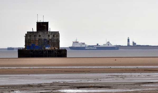 Haille Sand Fort, a ship passing in the Humber Estuary, and Spurn Point Lighthouse in the background (roughly 8 miles away)