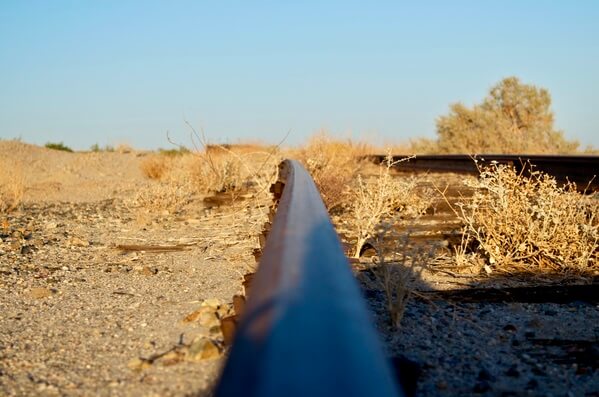 I loved the rusty look of the old tracks and the dry wood from the railroad ties.  Taken during the golden hour.