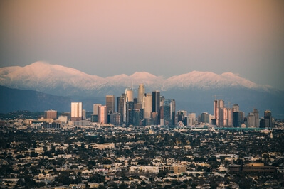 Taken at sunset in the month of February. Looking northeast towards downtown with snowcapped Mount Baldy in the background.