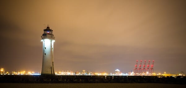 New Brighton Lighthouse with Liverpool Container base in the background. 