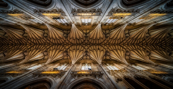 The incredible ceiling of the Winchester Cathedral photographed from the centre of the nave.