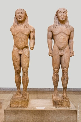 The Archaic Kouroi, Cleobis and Bithon, by Polymedes of Argos, 570-560 BC. These are mythical twins, brothers from Argos, who according to legend joined the chariot of their mother, a priestess of Hera, instead of the oxen, to take her to where the goddess's feast was being celebrated. An incomplete inscription attributes them to a... Medes of Argos, in whom the Argos sculptor Polymedes is recognised.