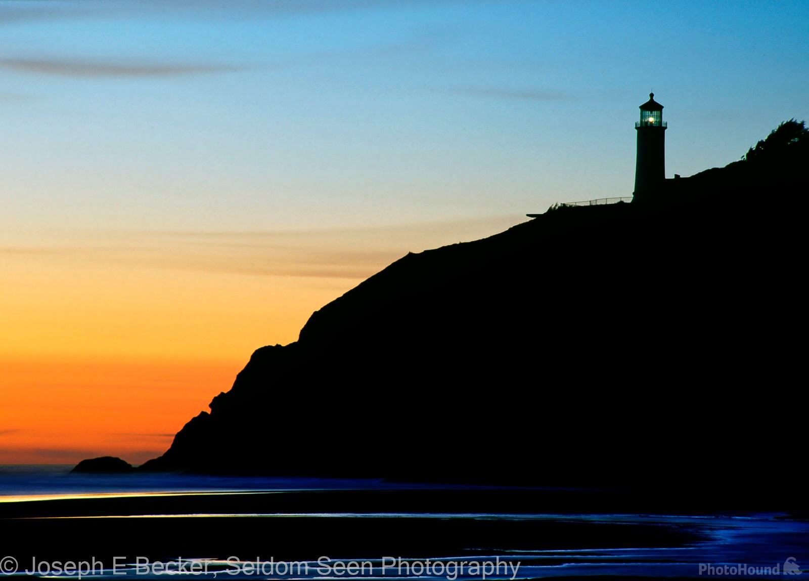Image of North Head Lighthouse from  Benson Beach by Joe Becker