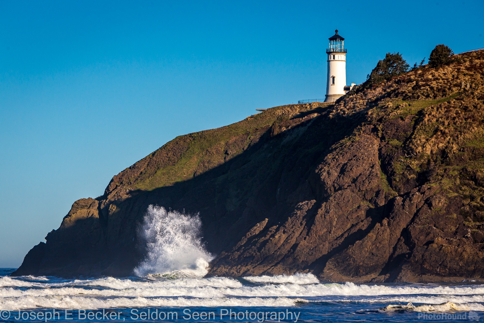 Image of North Head Lighthouse from  Benson Beach by Joe Becker