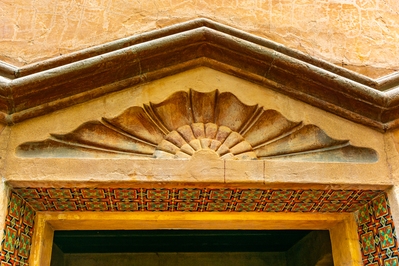 Door lintel at front entrance. Note the tile work.