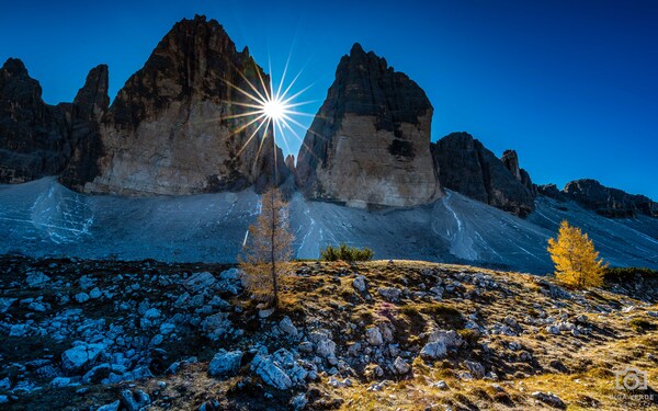 We made the hike around Tre Cime di Lavaredo in the autumn of 2021. I stepped from the shadow into the sun and saw this opportunity. 