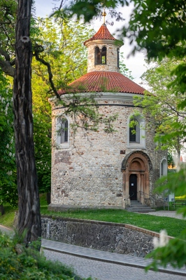 View of the Rotunda of St. Martin in the spring through the branches of the trees standing around.