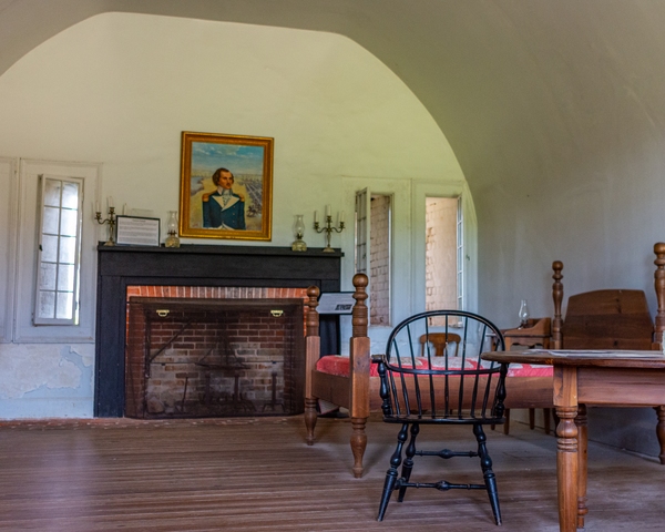Commanding Officer's quarters. The painting over the fireplace is of Count Casimir Pulaski for whom the fort was named. Pulaski was a Polish officer serving in the Continental  (American) Army during the American Revolution