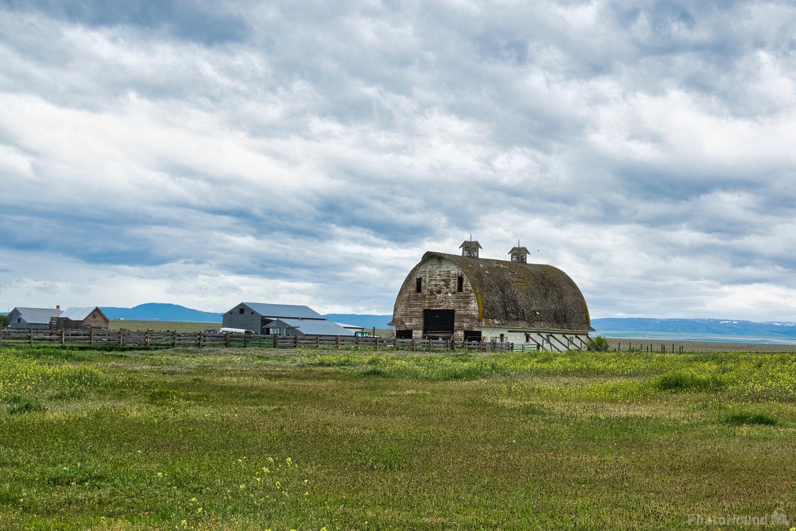 Image of Weathered White Barn by Steve West