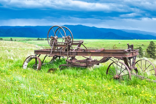This is a pull behind road grader which could use either a team of horses or a tractor if one could afford it back then.