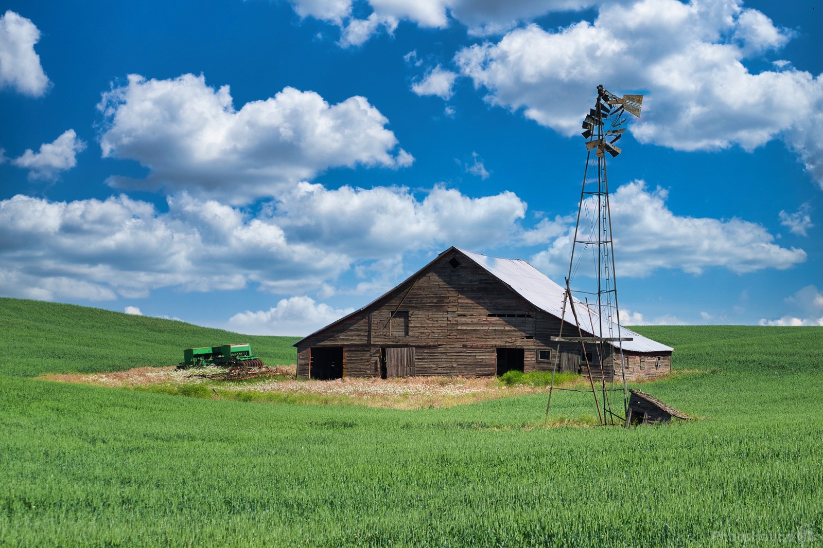 Image of Torn Windmill and old Barn by Steve West