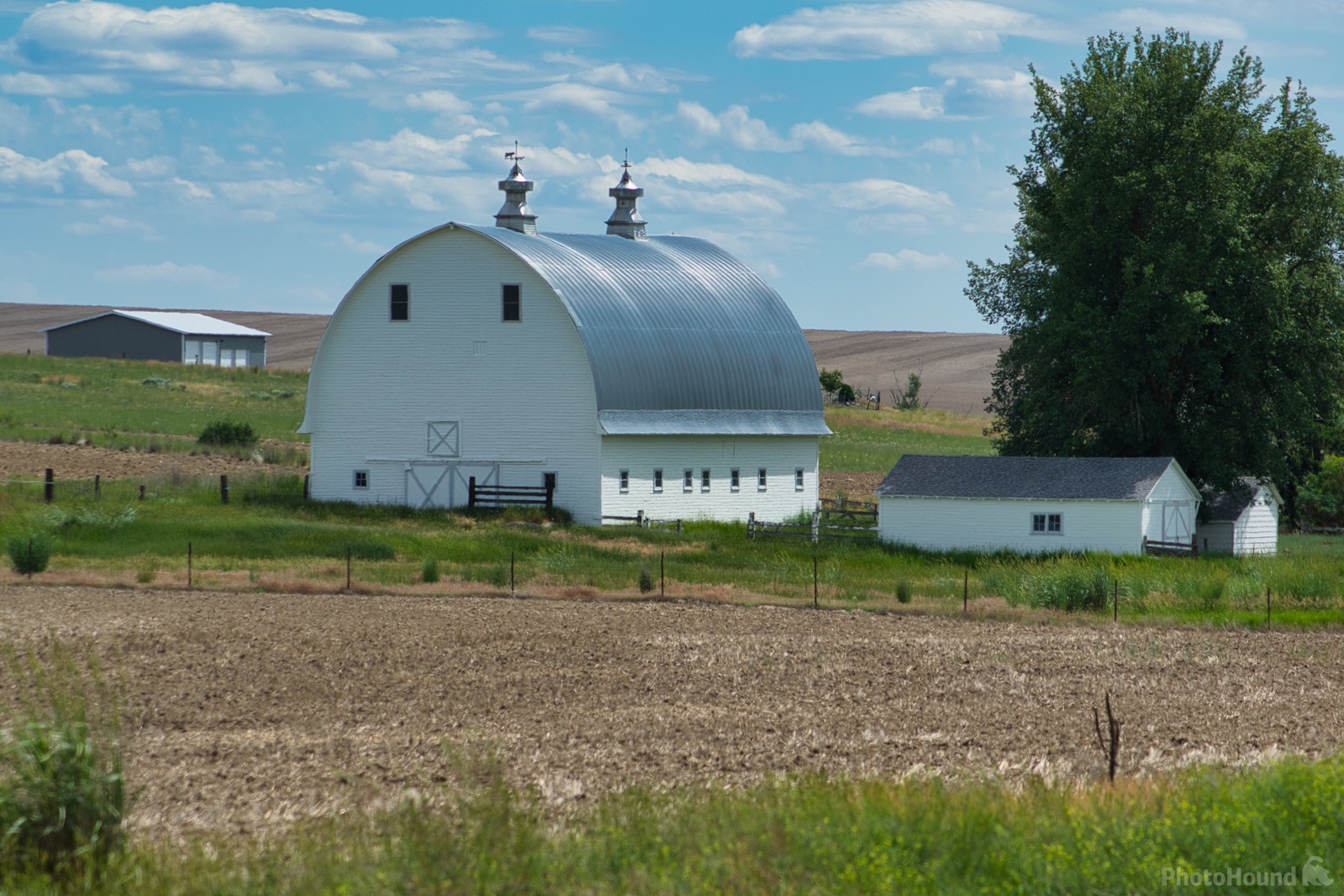 Image of White Double Cupola Barn by Steve West