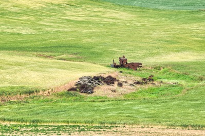 Photo of Rusty Old Harvester and Red Barn - Rusty Old Harvester and Red Barn