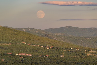 Full moon rising above Podvelež