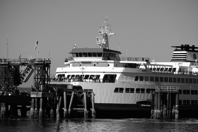 Edmonds is a small town on Puget Sound that is one end of the Edmonds-Kingston ferry route, that takes people to the Olympic Penninsula. In this image the ferry is just landing, and the passengers have just seen an eagle fly overhead.