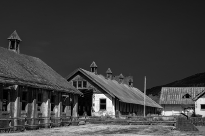 These abandoned barns were just starting to fall apart. I liked the contrasts between the walls and roofs.