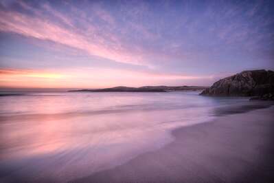 Clachtoll Beach at sunset in April.
