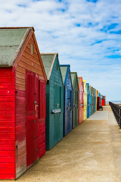 The colourful beach huts at Mundesley at the end of the season