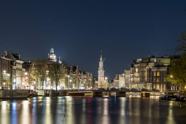 Beautiful Amsterdam canals come to life at night. 