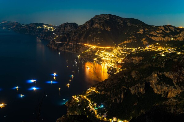 A night time shot of Positano from the trail called "path of gods"