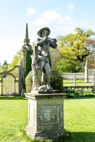 The piper statue in the side (kitchen) garden at Canons Ashby House.  Apparently he was killed after alerting parliamentarians that there was a troupe of royalists locally during the Civil War