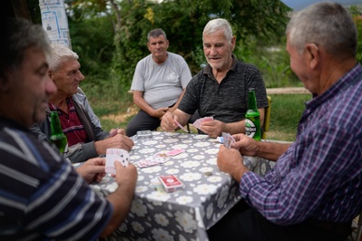 Locals playing card game at Veljuša village