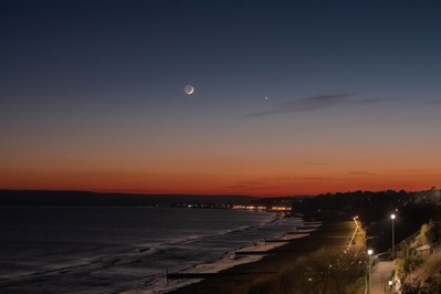 Bournemouth Promenade with crescent moon earthshine in conjunction with Venus and Jupiter.