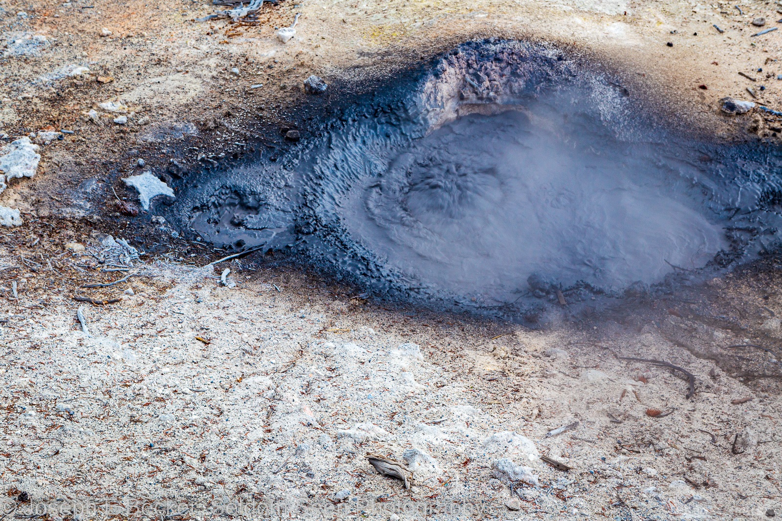 Image of Norris Geyser Basin, Blue Mud Steam Vent by Joe Becker