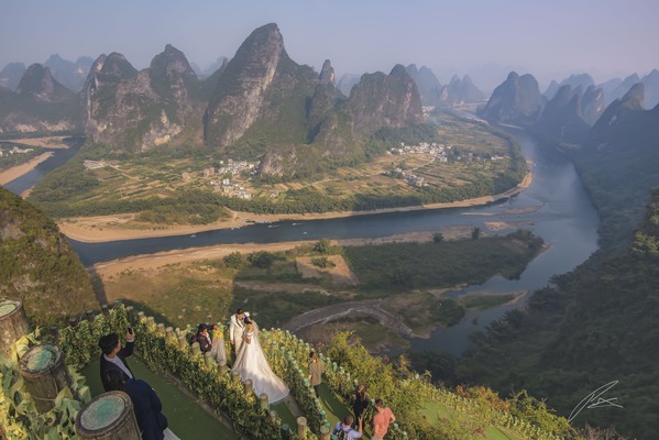 Wedding Photographer working above the Li River, Yangshuo County, China