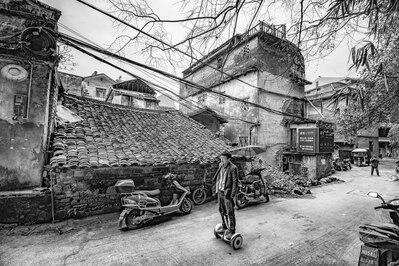 Random hoverboard street photo Yangshuo County, China