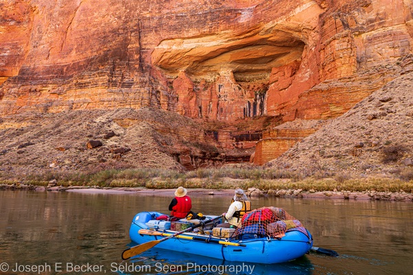 Rafting by a large alcove in Marble Canyon, about mile 42