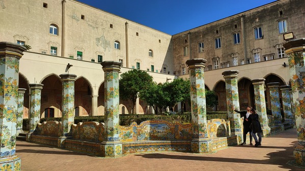 Upon entry- you are greeted by these beautifully decorated green pillars in the garden on the Santa Chiara complex.