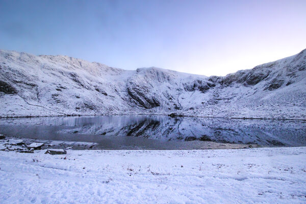 Winter at Cwm Idwal with a snow covered Devil's Kitchen. Snowdonia, North Wales December 2022