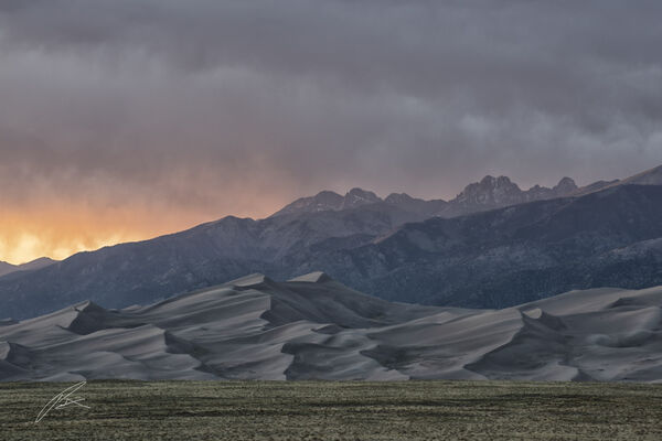 Great Sand Dunes with Blood of Christ Mountains (Sangre De Cristo Mountains) at sunset..shoot this off the highway just before the motel at entrance road to The Great Sand Dunes Park