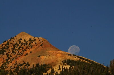 I was surprised to look North for  this Luna composition of the full moon setting behind the ridge as I climbed out of the Clear Creek valley. 