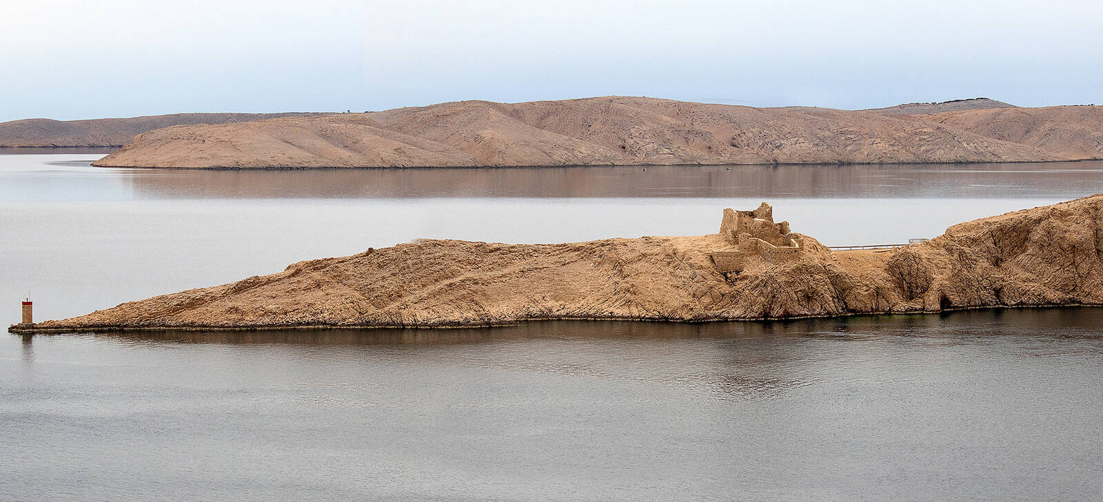 Image of Fortica Ruins from Pag Bridge by Simon Kovacic