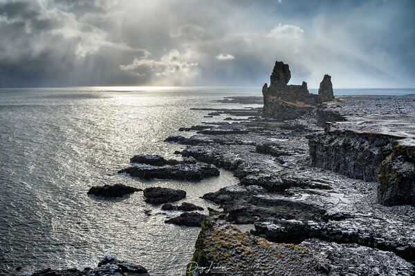 The Lóndrangar sea stacks in Iceland were still an impressive sight even with a cloudy sky and a very windy day