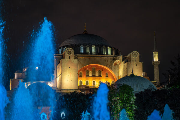 The fountain is illuminated at night, making for a fun foreground to a shot of the mosques in the area.