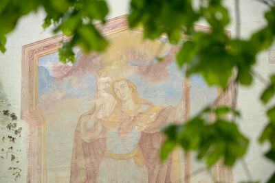One of the frescoes outside