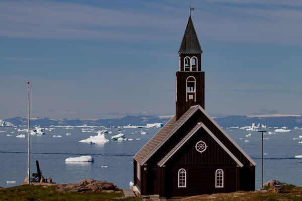 The Zion's church in Ilulissat with a pinky sky.