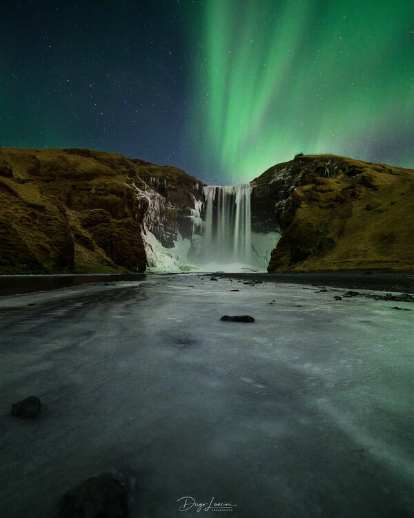 Northern Lights above Skogafoss waterfall