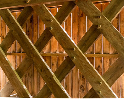 Closeup of the lattice trusses and wooden peg connectors.