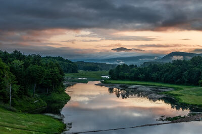Sunrise and Mt. Ascutney from the viewing benches at the top of the dam.