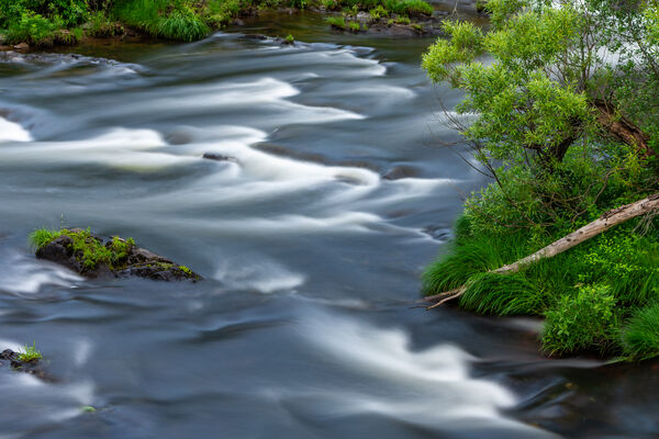 White water at the base of the cascade. 10-stop ND filter.