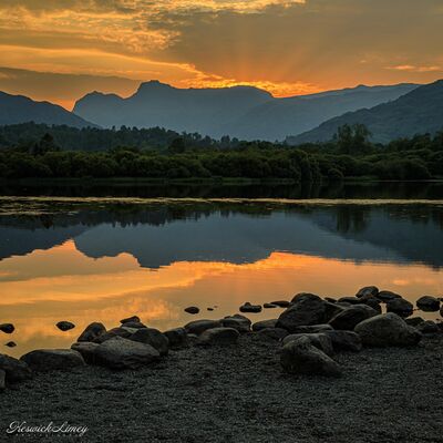 Looking to the Langdale Pikes at sunset from Elter Water.