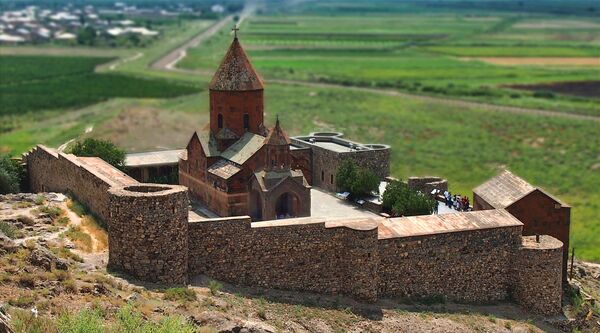 "Khor Virab Monastery" 
Armenia became the first Christian Nation in 301 AD.  This is the location where "Gregory the Illuminator", was imprisoned, for 13 years, prior to the King accepting Christianity. 
 