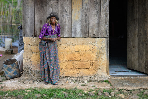 Old lady in the village near Ruteng