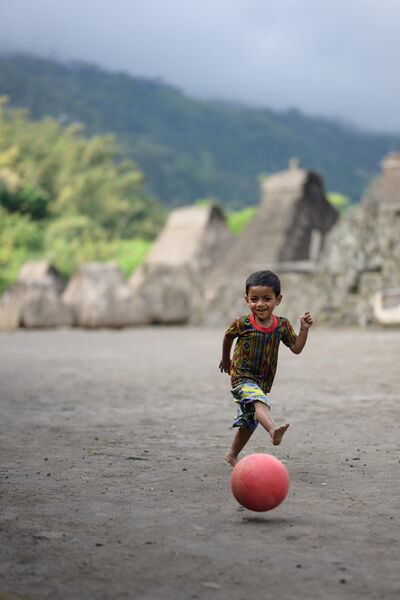 Bena Traditional Village - small boy playing football