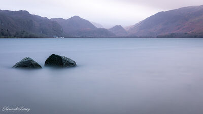 The Centennial Stones in Calfclose Bay looking to Borrowdale.